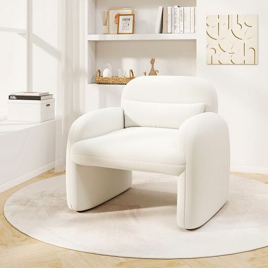 This Modern Sherpa Accent Chair  in a bright white is a masterclass in soft geometry, featuring continuous, flowing lines and a weighted, ground-hugging silhouette. Wrapped in ultra-tactile sherpa upholstery, it’s a curvilinear statement piece that invites you to sink in and stay a while.
